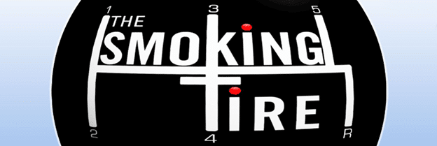 "The Smoking Tire" logo resembling a gear shift pattern on a black background.